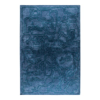 Blue area rug with an abstract maze pattern in varying shades of deep turquoise and teal. Perfect for modern decor.