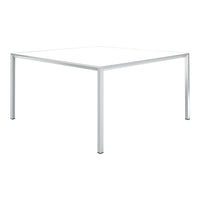 White square table with minimalist design and sleek silver legs, perfect for modern decor.