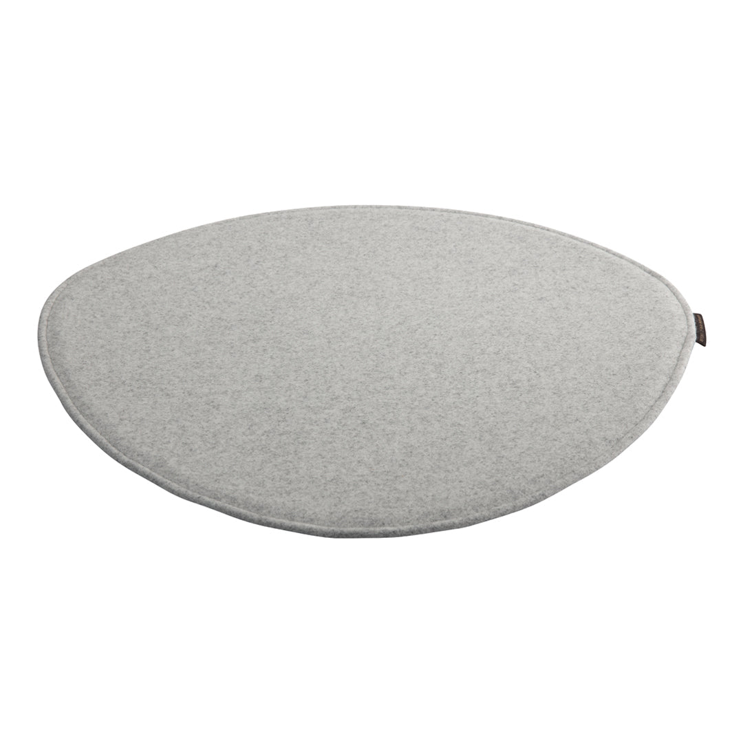 Soft gray oval cushion with a smooth texture, ideal for modern home decor. Minimalist design with no patterns.