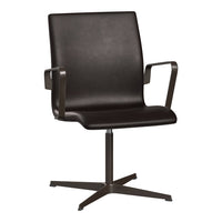 Black leather office chair with a sleek design and modern metal accents, featuring a smooth, minimalist surface.