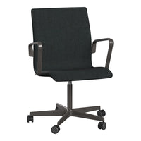Sleek black office chair with a modern design and smooth fabric, featuring a minimalist pattern and silver accents.