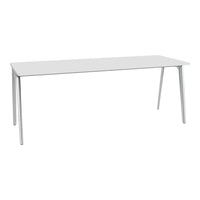 White rectangular table with sleek silver legs, featuring a smooth, solid surface and minimalist design.