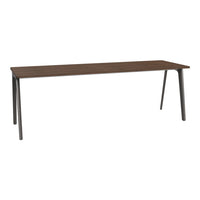 Wooden table with a rich brown surface and sleek black metal legs, featuring a minimalist design.