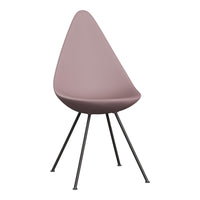 Pink teardrop chair on black metal legs, smooth matte finish, minimalist design suitable for modern interiors.