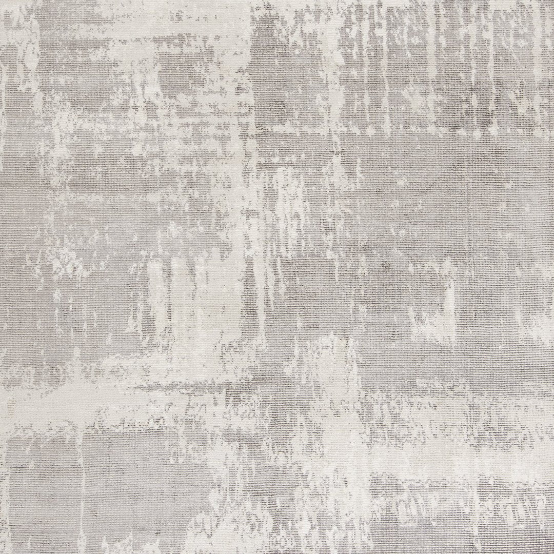 Abstract gray and white pattern with textured brush strokes, perfect for modern decor.