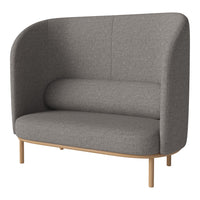 Gray upholstered sofa with a minimalist design and curved backrest, featuring natural wood legs. Perfect for modern interiors.