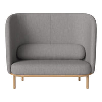 Gray upholstered two-seater sofa with a smooth surface and light wood legs, featuring a minimalist design.