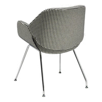 Black and white houndstooth pattern chair with sleek chrome legs, perfect for modern decor.