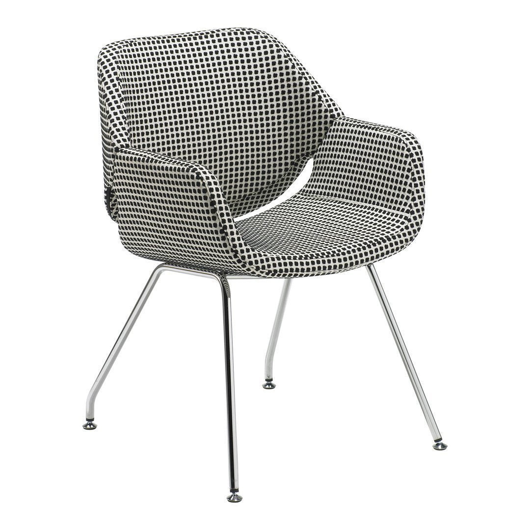 Black and white houndstooth patterned chair with chrome legs, modern design, perfect for stylish interiors.
