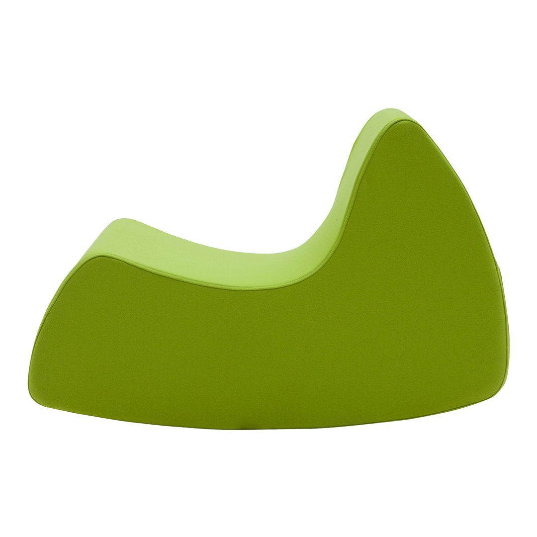 Curved lounge chair in vibrant lime green with smooth, modern contours and a sleek design.