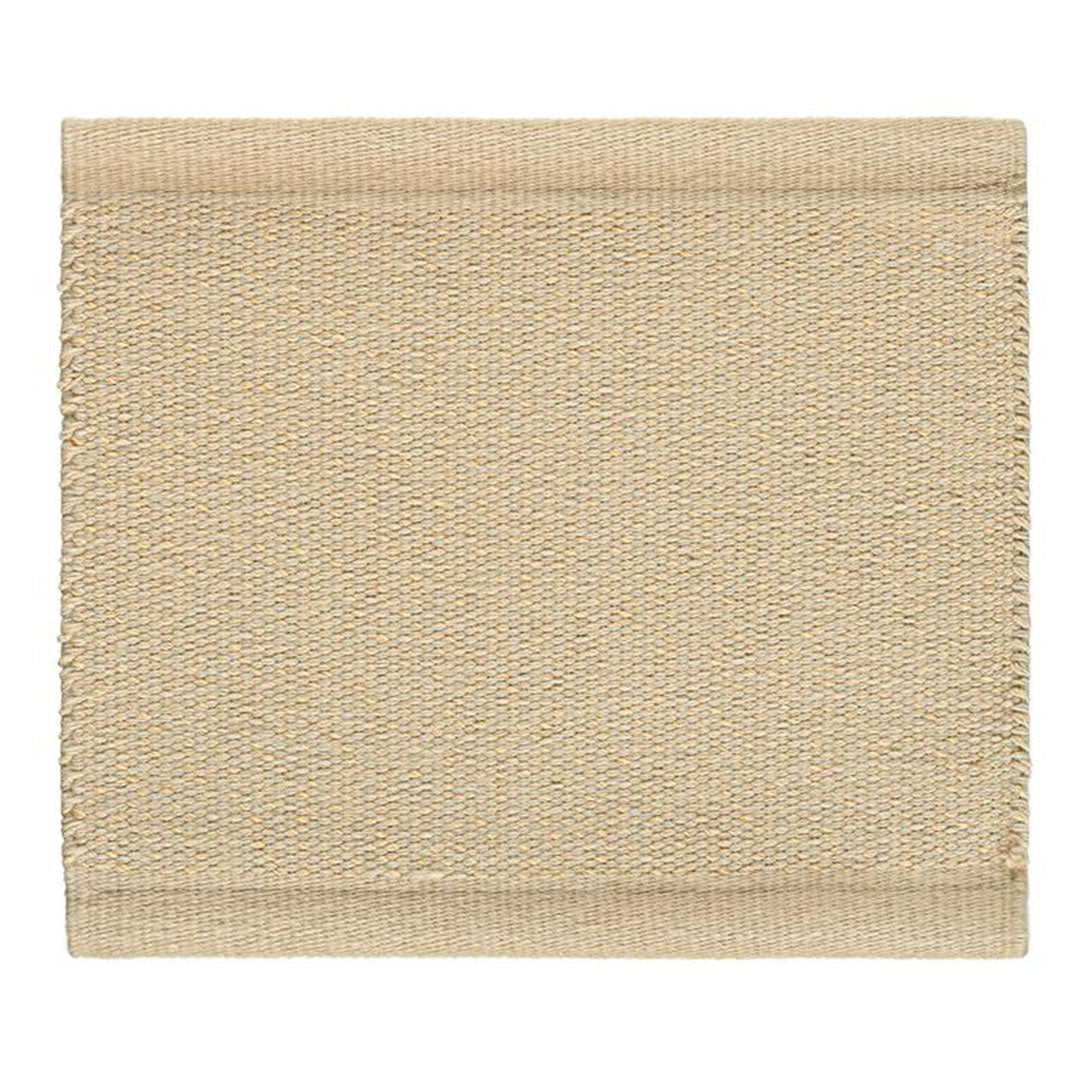 Beige textured fabric with a subtle woven pattern, perfect for home decor or craft projects.