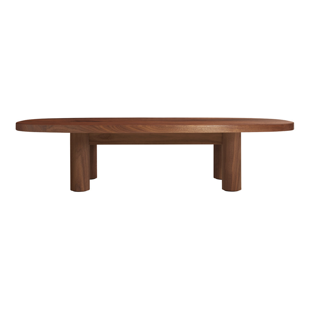 Wooden coffee table in rich brown with smooth, oval top and thick, sturdy legs. Ideal for modern interiors.