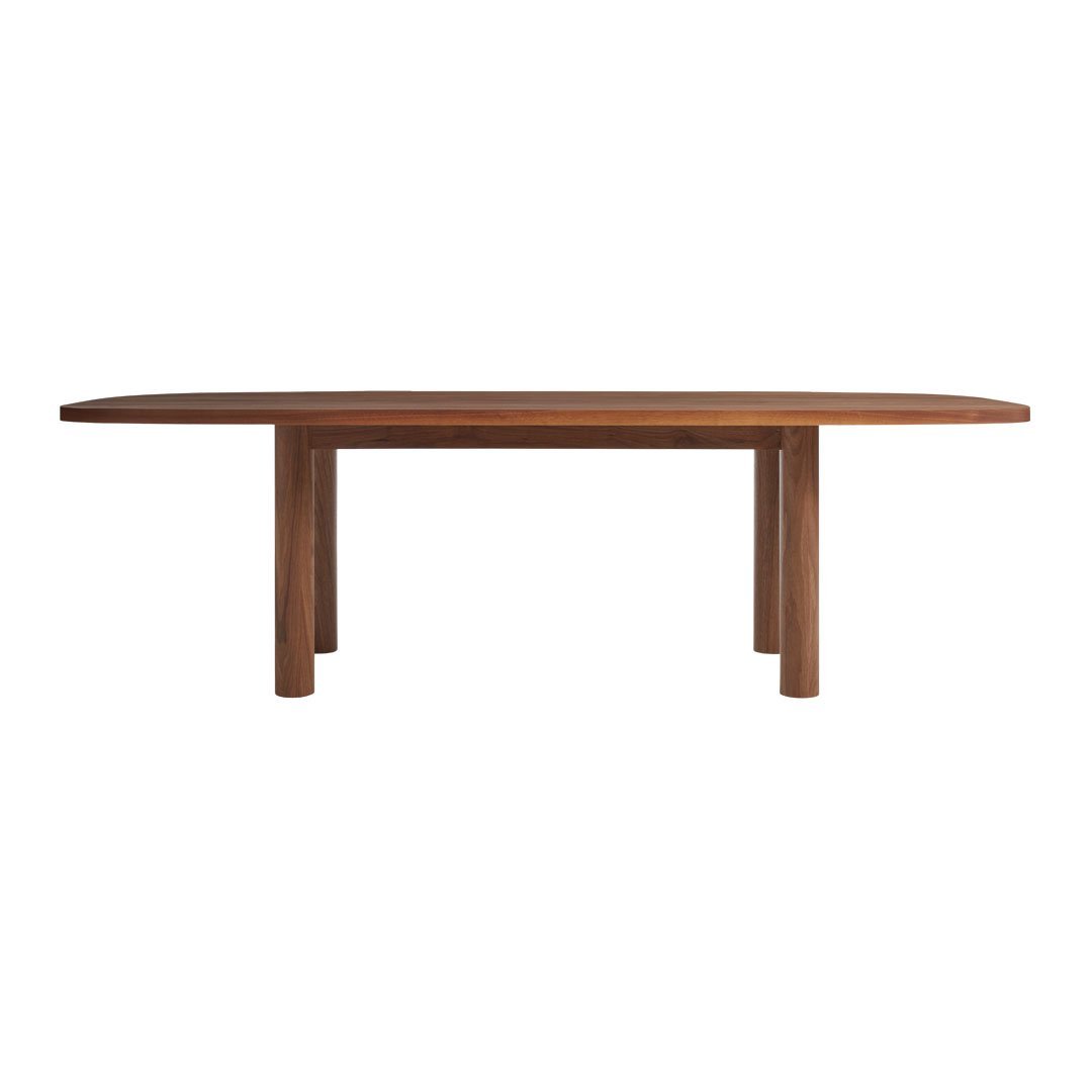 Wooden dining table featuring a rich brown finish and smooth, oval shape with simple, sturdy legs.