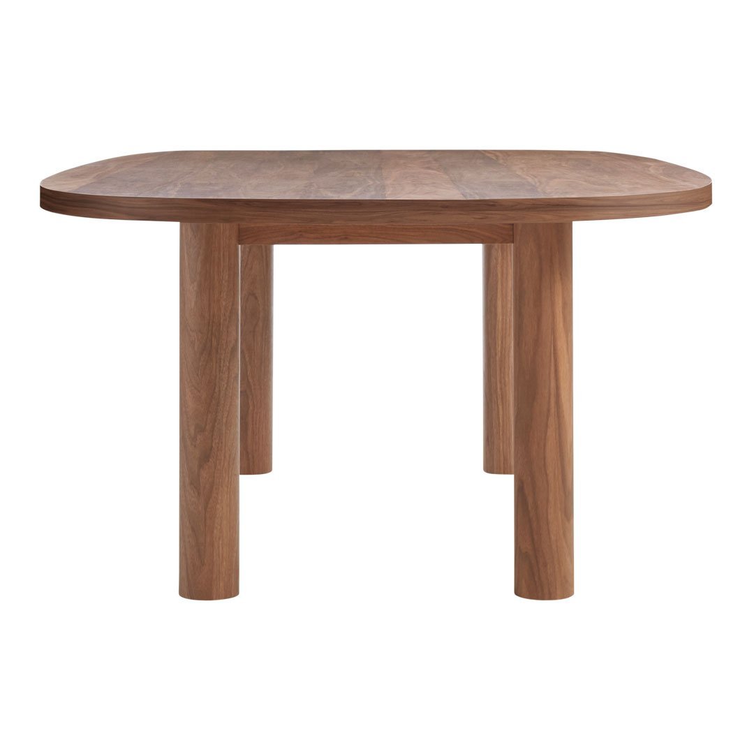 "Modern round wooden table in warm brown tones with a smooth finish and sleek cylindrical legs."