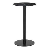 Black round side table with a sleek, minimalist design and a smooth finish. Subtle linear pattern on the tabletop.