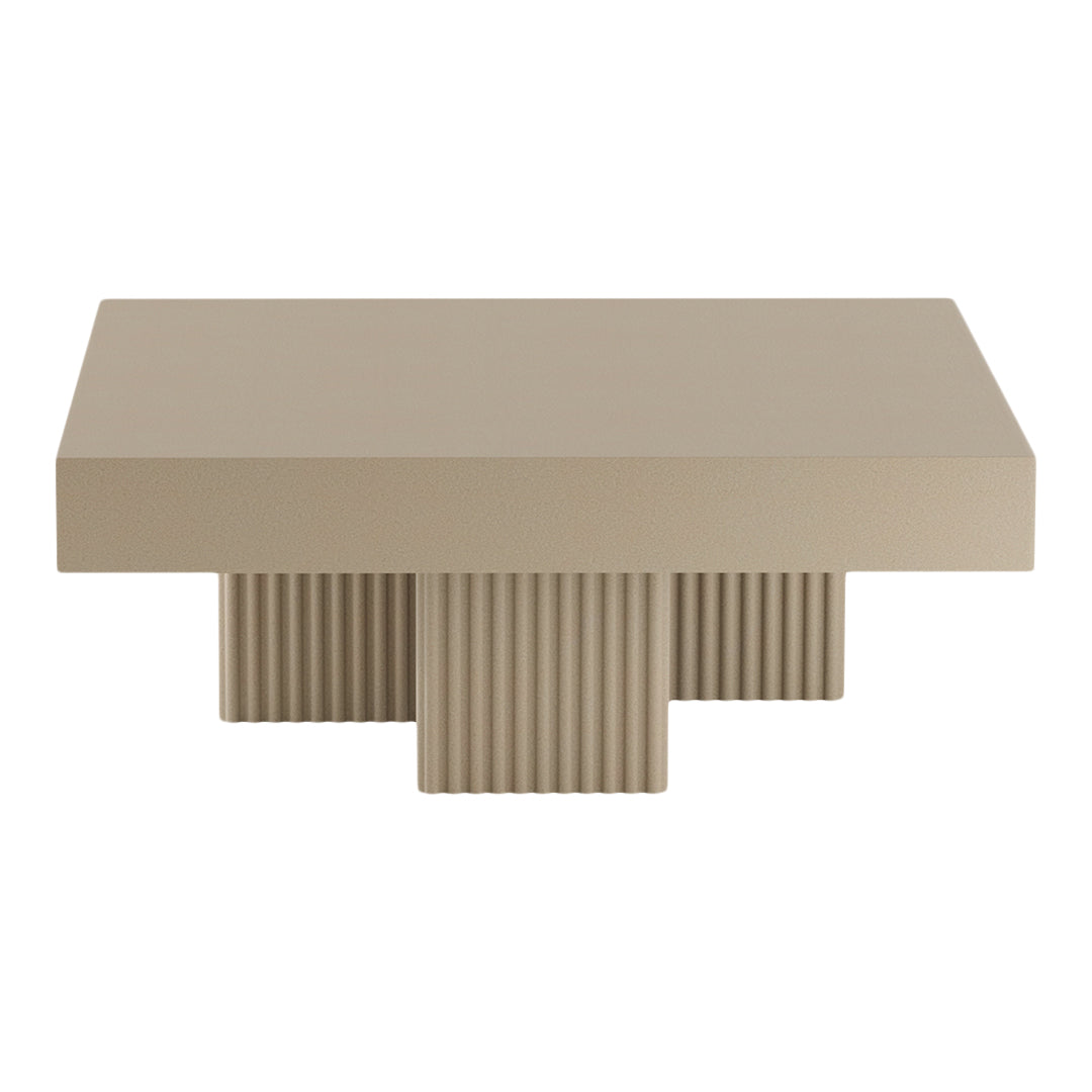 Beige modern coffee table with a smooth top and ribbed base, featuring minimalist design and neutral tones.