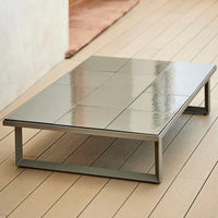 Stylish gray ceramic coffee table with a sleek, glossy finish and modern geometric pattern. Perfect for any contemporary space.