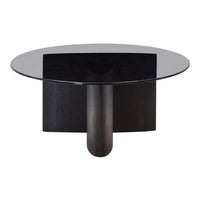 Round black glass table with a matte black base, featuring a sleek and modern design. Elegant and minimalist style.
