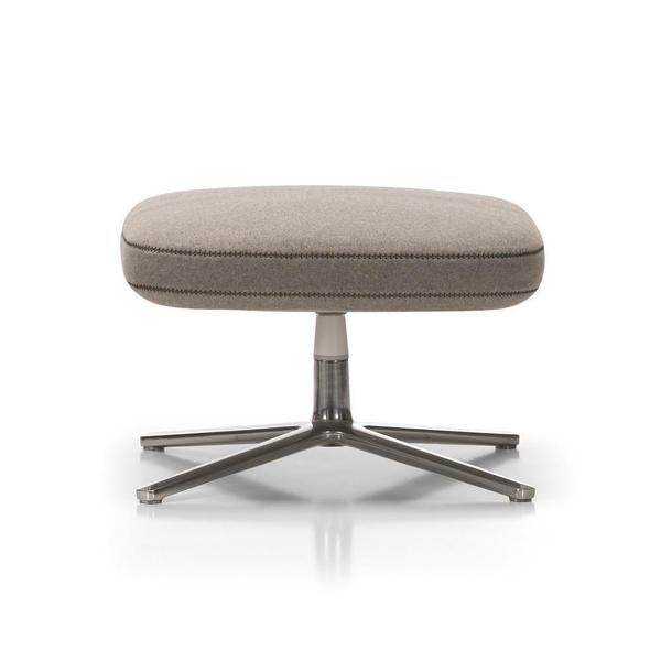 Light gray upholstered ottoman with a sleek, modern design and a polished metal base. Perfect for contemporary decor.