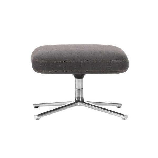 Gray upholstered ottoman with a smooth fabric finish and polished chrome base, featuring a minimalist design.
