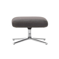 Gray upholstered ottoman with a smooth fabric finish and polished chrome base, featuring a minimalist design.