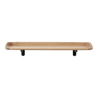 Natural wood shelf with a smooth beige finish and black pipe brackets, showcasing a minimalist design.