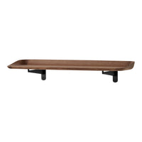 Brown wooden shelf with smooth edges and black metal brackets. Simple, modern design perfect for any decor.