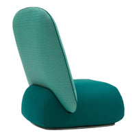 Teal upholstered chair with a textured back and smooth, solid seat, showcasing a modern design.