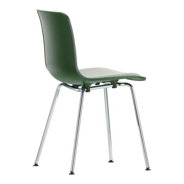 Green plastic chair with a smooth finish and chrome legs, ideal for modern decor. Perfect blend of style and functionality.