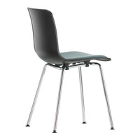 Stylish black chair with a sleek chrome base and smooth, minimalist design. Perfect for modern decor.