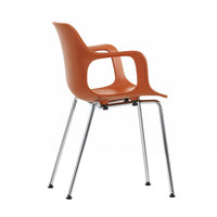 Modern orange chair with a sleek, curved design and chrome legs, perfect for contemporary decor.
