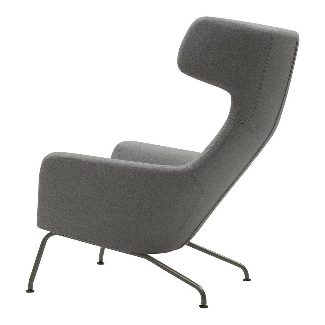 Gray upholstered modern armchair with sleek lines and minimalist design, featuring a smooth fabric texture.