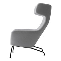 Gray upholstered chair with smooth, minimalist design and contrasting black metal legs. Perfect for modern decor.