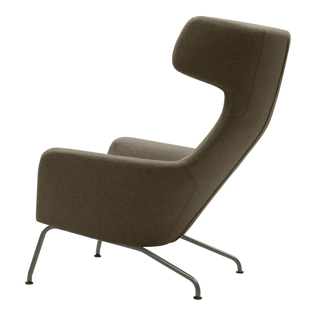 Stylish brown upholstered armchair with smooth contours and minimalist metal legs, perfect for contemporary decor.