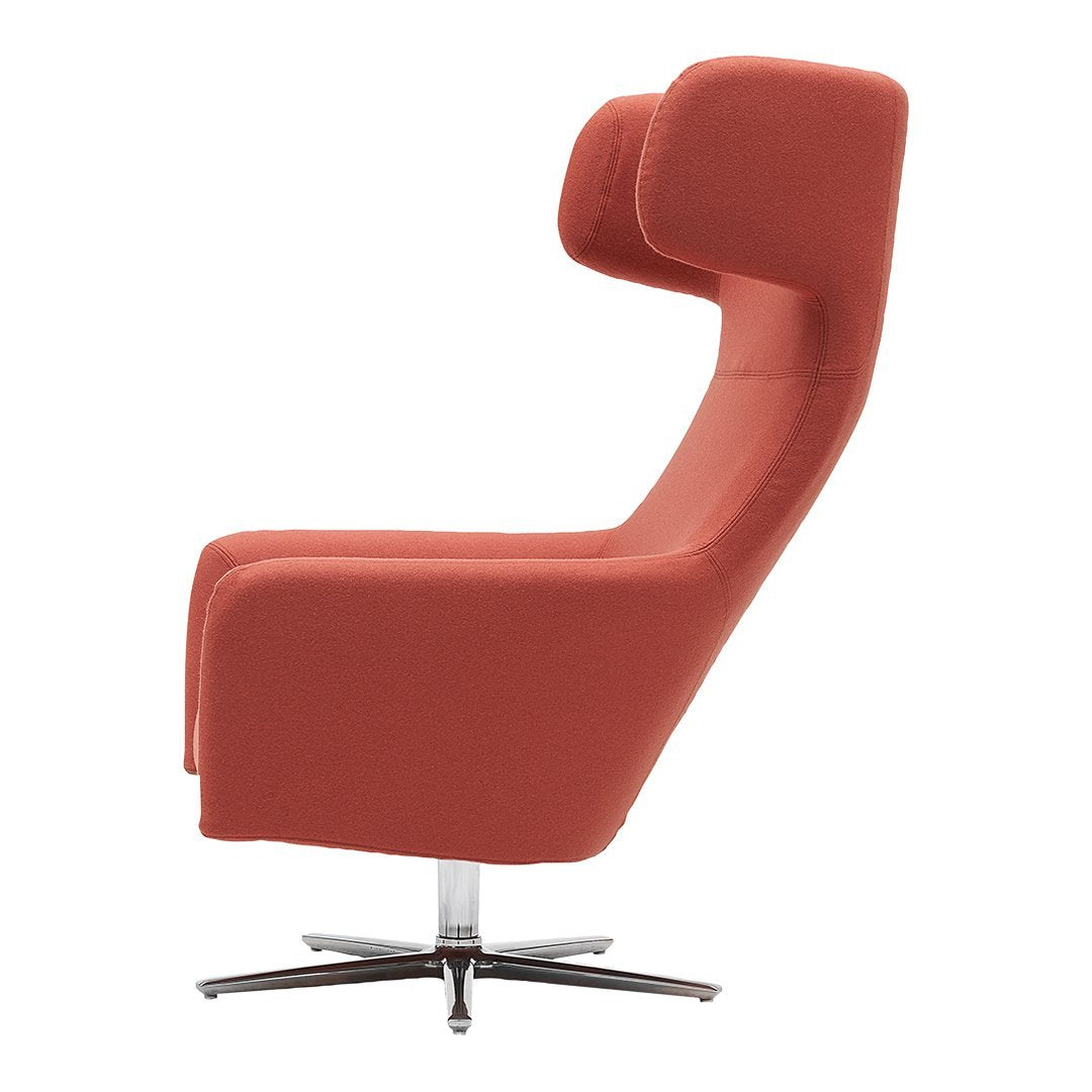Coral red modern chair with sleek lines and smooth upholstery, featuring a chrome base for a contemporary look.