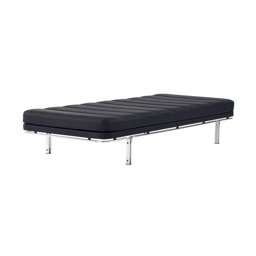 Black upholstered daybed with horizontal stitching on a sleek chrome frame, offering a modern minimalist aesthetic.