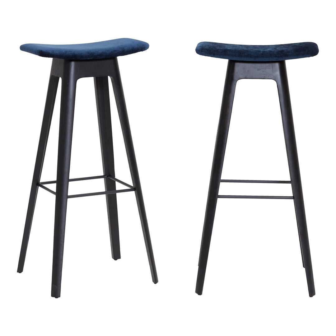 Navy blue velvet bar stools with sleek black wooden legs and minimalistic design. Perfect for modern decor.