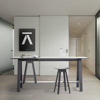 Modern black and white table with sleek design, featuring a minimalistic color palette and clean lines.