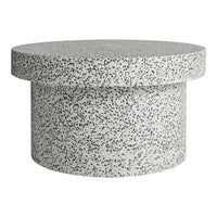 Gray speckled round coffee table with a smooth top and cylindrical base, featuring a minimalist design.