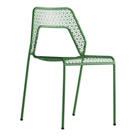 Green patterned chair with a geometric design and sleek, modern lines. Perfect for contemporary decor.