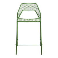Green patterned bar chair with a distinctive cut-out design and sleek metal frame. Perfect for modern decor.