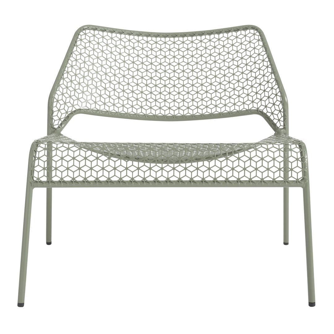 Light green lounge chair with a geometric honeycomb pattern and minimalist design. Perfect for outdoor spaces.