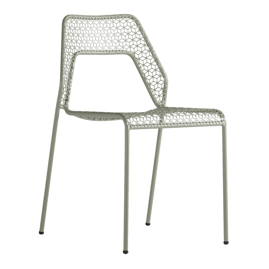 Light green chair with a stylish woven pattern and sleek metal legs, perfect for modern indoor or outdoor spaces.