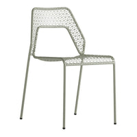 Light green chair with a stylish woven pattern and sleek metal legs, perfect for modern indoor or outdoor spaces.