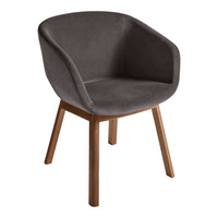 Stylish gray velvet chair with wooden legs, featuring a smooth, modern design perfect for any decor.