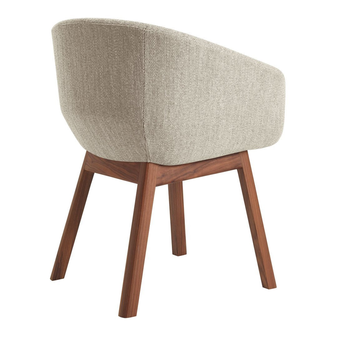 Light beige upholstered chair with a smooth texture and walnut-colored wooden legs. Elegant and modern design.