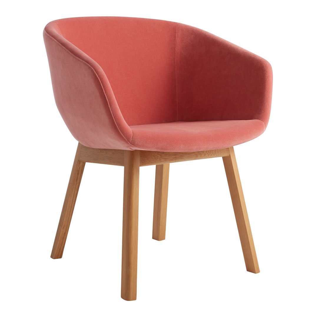 Coral pink upholstered chair with wooden legs, featuring a sleek, modern design and smooth texture. Perfect accent piece.