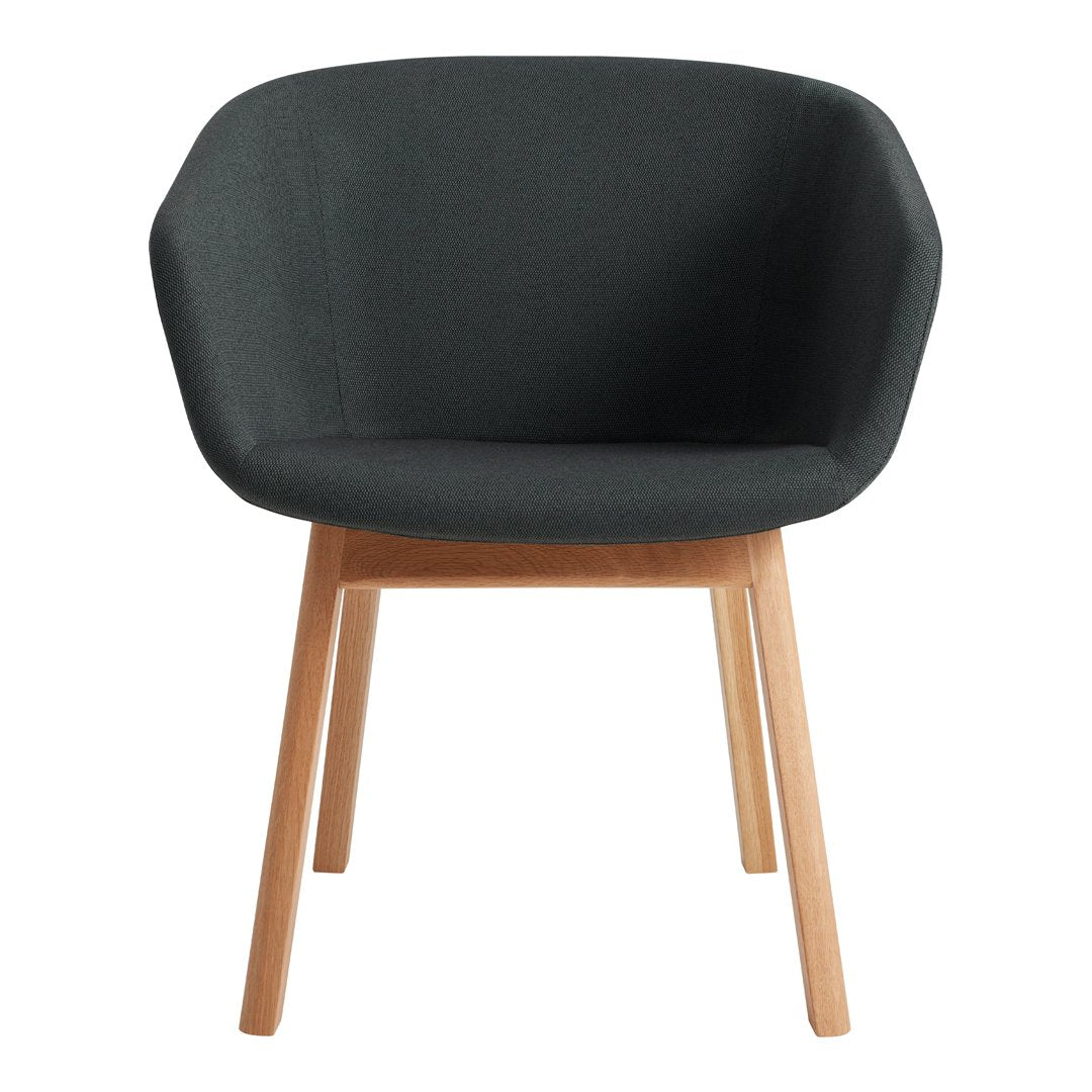 Stylish dark gray fabric armchair with natural wood legs, featuring a smooth, modern design. Ideal for contemporary decor.