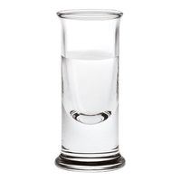 Clear glass shot glass with a smooth, modern design and subtle curves, ideal for serving drinks.