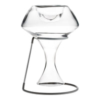 Clear glass vase with a sleek, modern design and minimalist metal stand, featuring smooth curves and a polished finish.